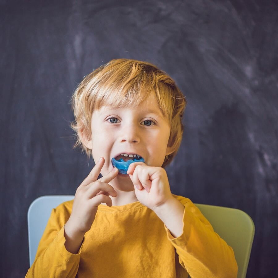 Myofunctional appliance is being worn by child as a preventive orthodontic treatment.